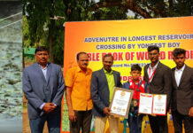 12 y.o. boy Crosses 337 Ft Reservoir in 7 minutes! sets world record